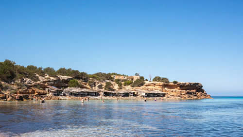 Scenic view of sea against clear sky