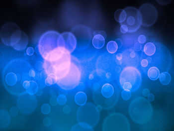 Defocused image of illuminated christmas lights