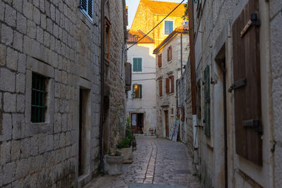 The narrow cobbled street of stari grad town on hvar island, croatia