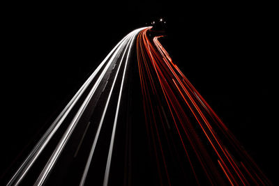 Close-up of light trails against black background