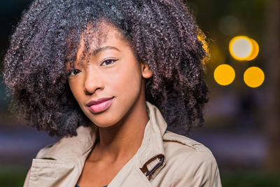 Portrait of young woman outdoors