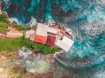 High angle view of swimming pool by sea