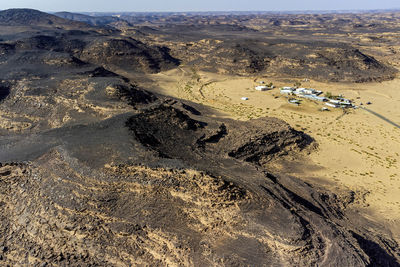 Saudi arabia, najran province, najran, aerial view of hills surrounding archaeological site of bir hima