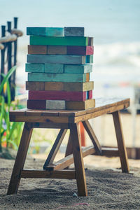 Close-up of colorful blocks on wooden table