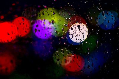 Full frame shot of raindrops on glass