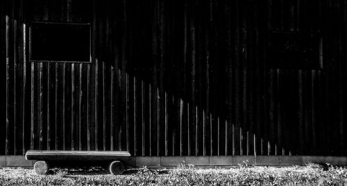 Empty seats on field against wall