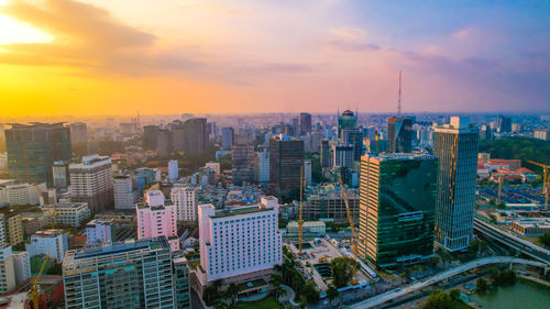 High angle view of cityscape against sky during sunset