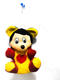 Close-up of stuffed toy over white background