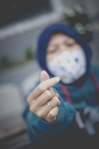 Portrait of person wearing mask