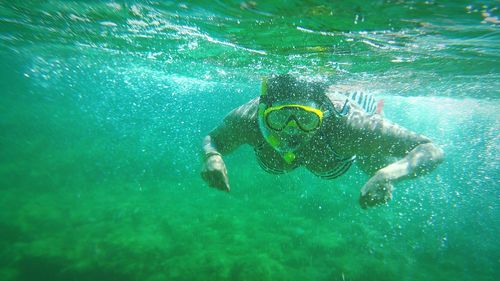 Woman snorkeling in sea