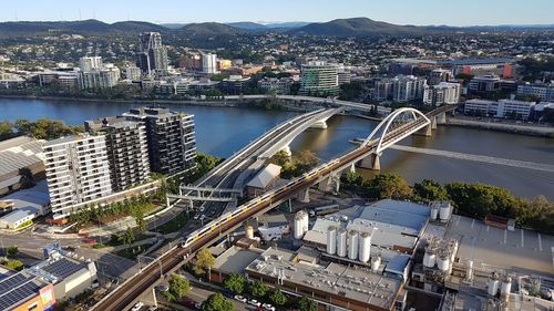 High angle view of bridge and buildings in city