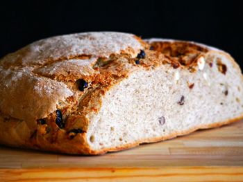 Close-up of bread on black background