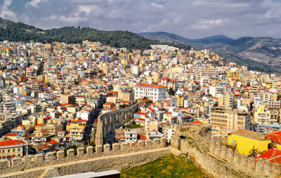 Buildings against sky on sunny day