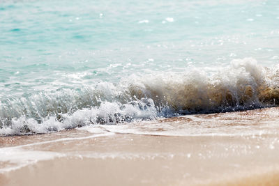 Waves splashing on shore