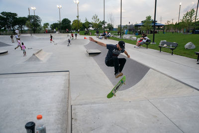 Group of people skateboarding on skateboard