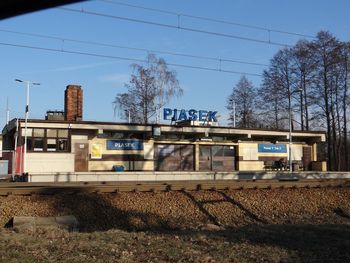 Train on railroad track against sky