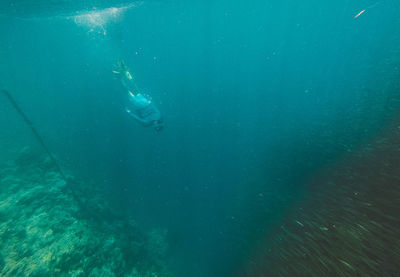 Person swimming in sea