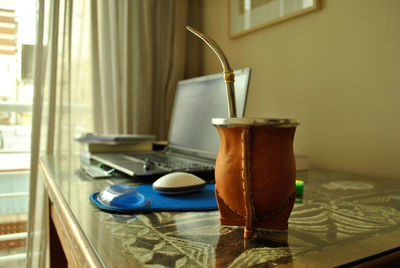 Close-up of drink on table at home