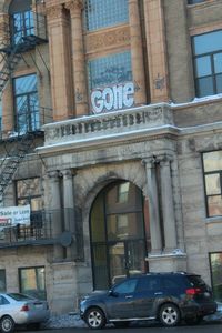 Cars parked in front of building