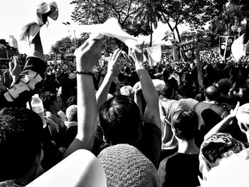 Crowd of people in traditional clothing