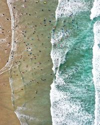 Aerial view of people in sea