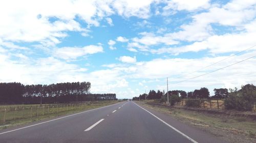 Empty road against sky