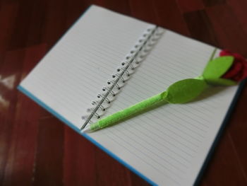 High angle view of book on table