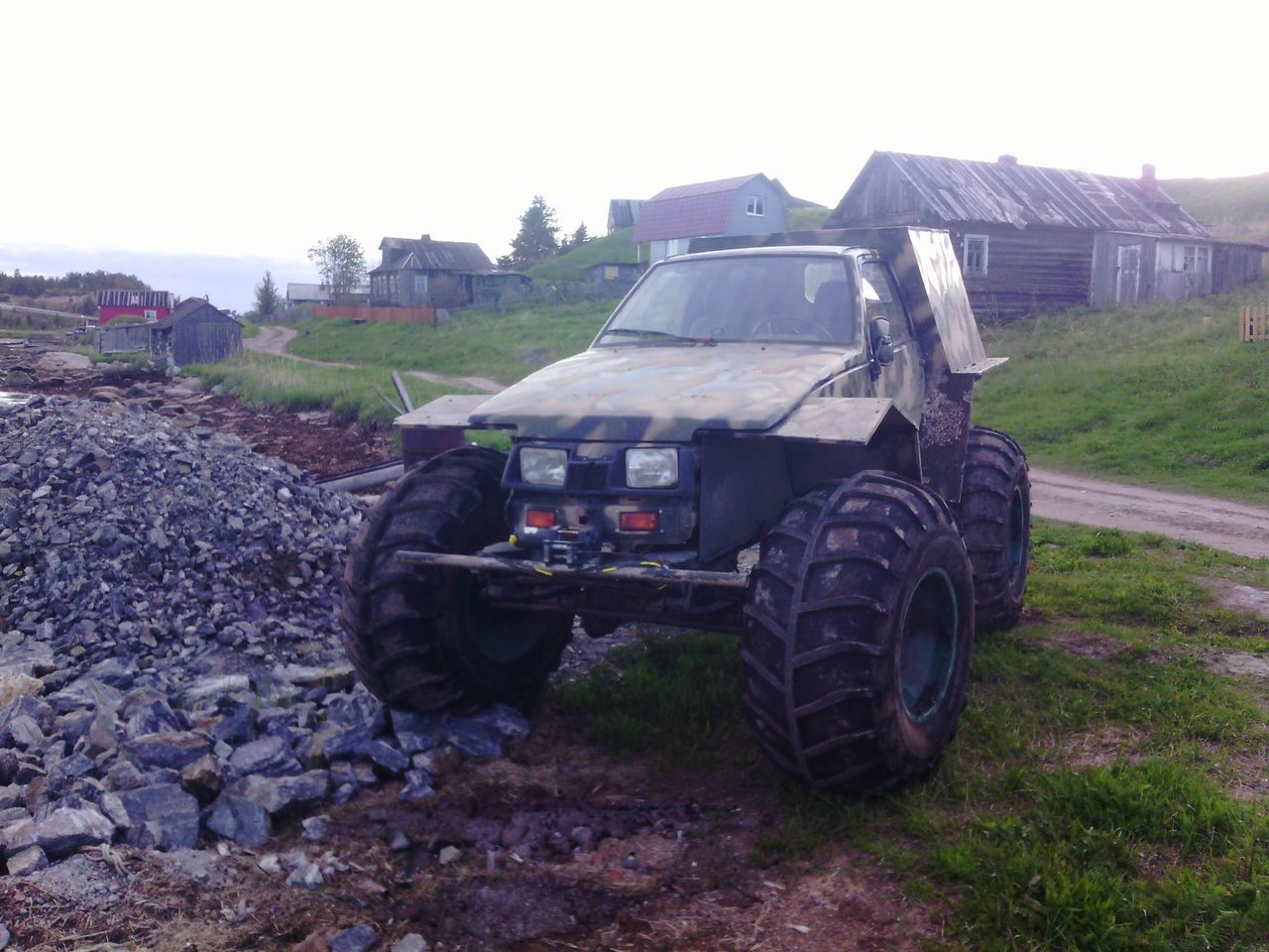 transportation, land vehicle, mode of transport, car, abandoned, field, obsolete, damaged, building exterior, built structure, day, men, grass, architecture, sky, landscape, travel, old, stationary, tractor