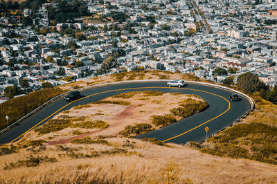 High angle view of road amidst buildings