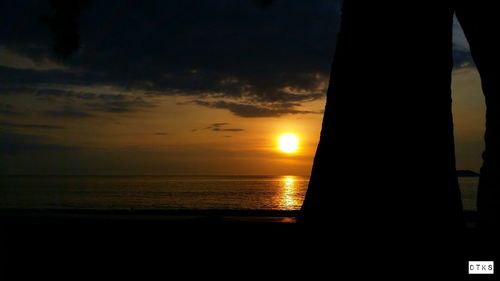 Scenic view of sea at sunset