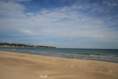 Scenic view of beach against sky