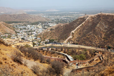 High angle view of jaigarh fort by mountain