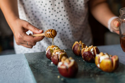 Midsection of woman preparing food