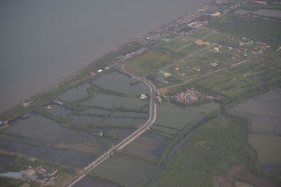 High angle view of illuminated agricultural field against sky at night