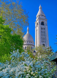 Low angle view of building against blue sky