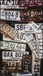 Close-up of abandoned rusty license plates