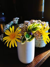 Close-up of flower vase on table