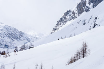 Snow covered mountain against sky