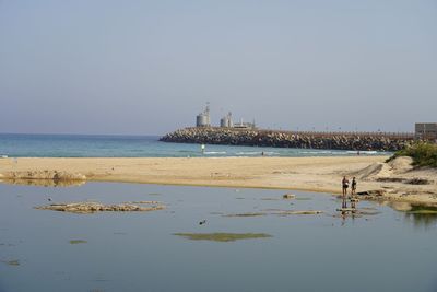 Scenic view of sea against clear sky