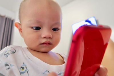 Portrait of cute baby at home