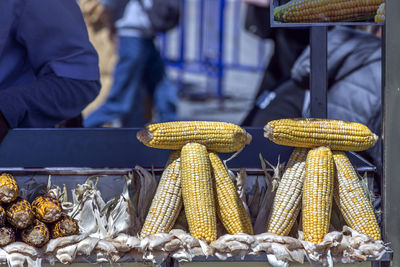 Midsection of man preparing food