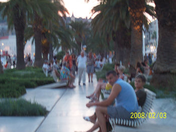 People relaxing in park