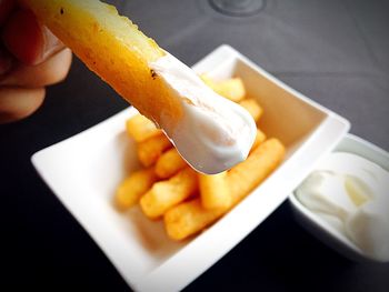 Close-up of hand holding food