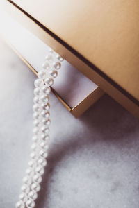 High angle view of rope tied on table