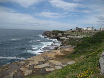 Scenic view of beach against sky