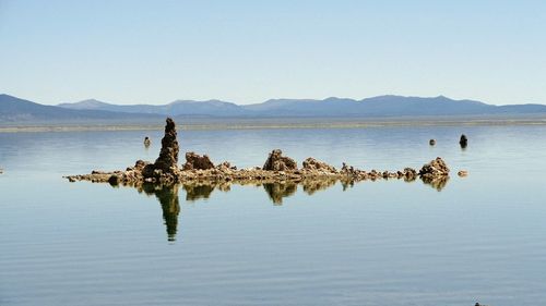 Scenic view of sea against clear sky