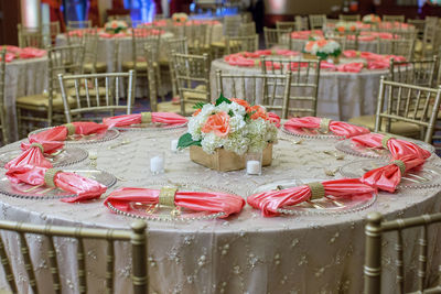 Arranged dining tables during wedding