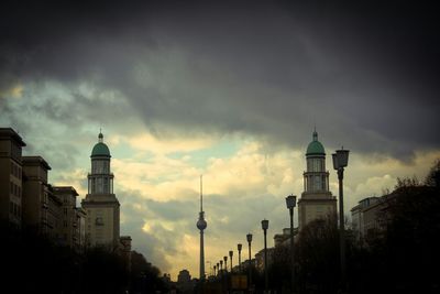 Low angle view of church against cloudy sky