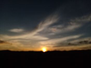 Scenic view of dramatic sky during sunset