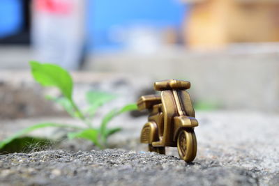 Close-up of toy car on rock